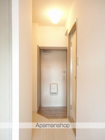 スカイコート武蔵関・伊勢亀ビルの玄関写真