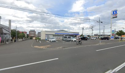 コンビニ　ローソン札幌西野2条7丁目店（コンビニ）まで704m