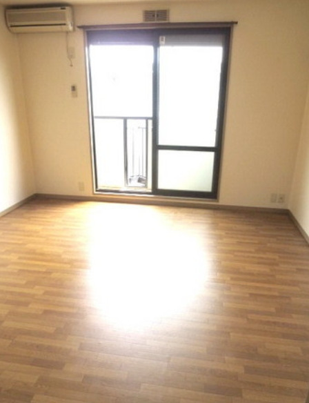 居室・リビング　別部屋の写真を使用しております。