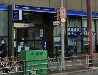銀行　みずほ銀行十三支店（銀行）まで220m