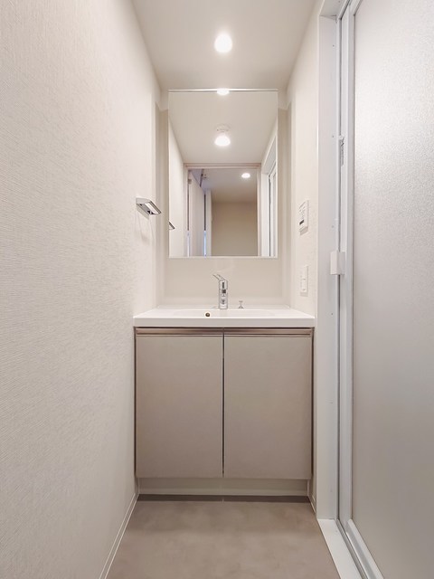 洗面設備　写真は同タイプ住戸です。