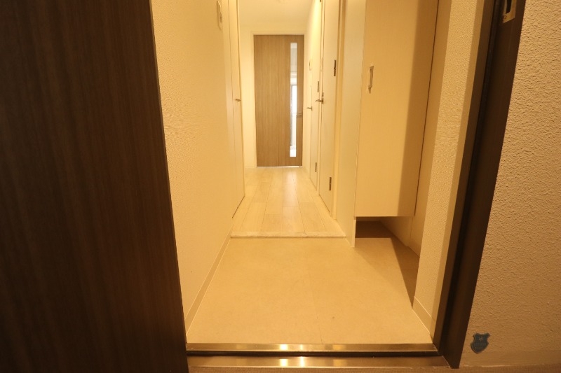 玄関　ゆとりある設計で、お客様を心地よく迎える玄関口。