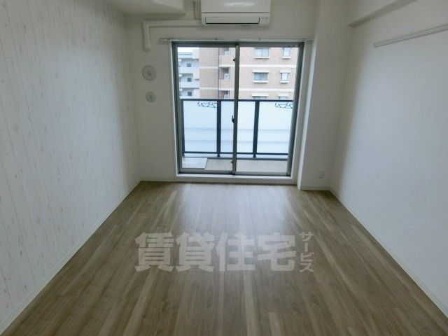 地下鉄烏丸線 九条駅 徒歩8分 7階建 築6年の居間写真