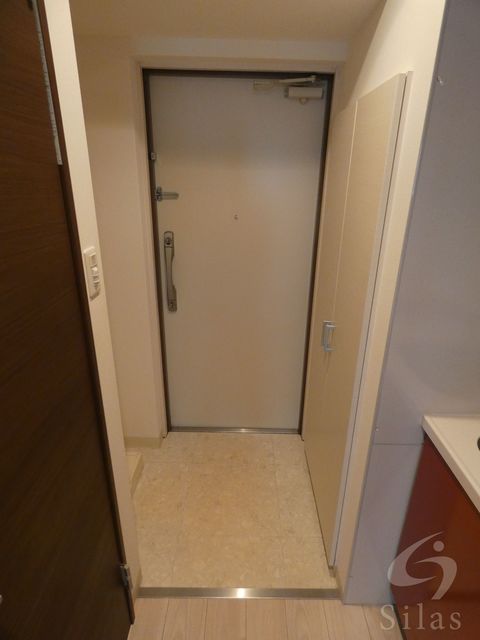 ＪＲ東西線 加島駅 徒歩1分 14階建 築12年の玄関写真