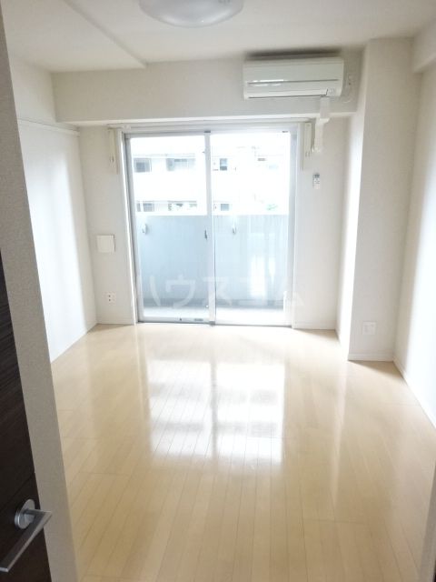 アクシーズタワー浦和岸町IIの居間写真