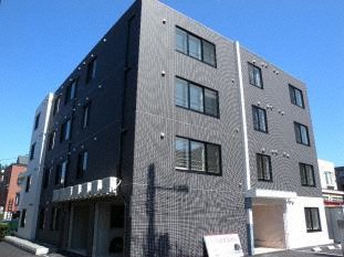 札幌市豊平区豊平七条のマンションの建物外観