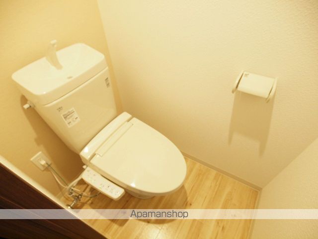 地下鉄南北線 麻生駅 徒歩4分 4階建 築10年のトイレ写真