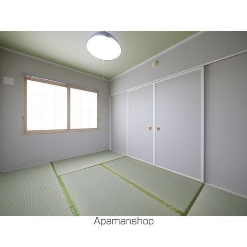 ホワイトヴィラ74の居間写真