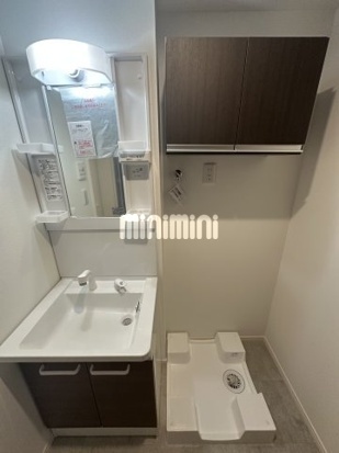 洗面設備　同一施工会社の参考写真です。
