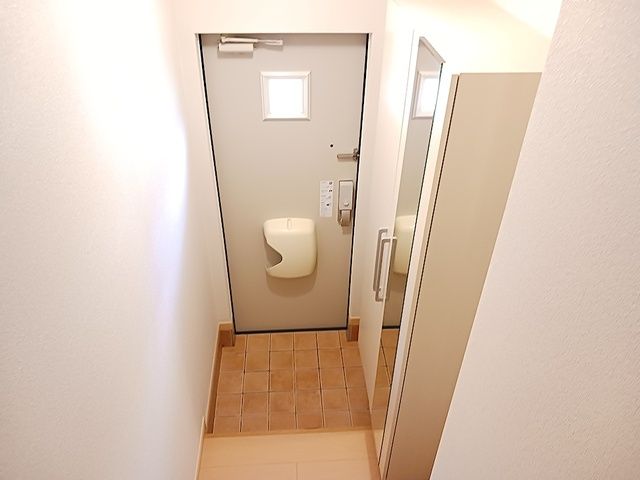 サニー KVの玄関写真