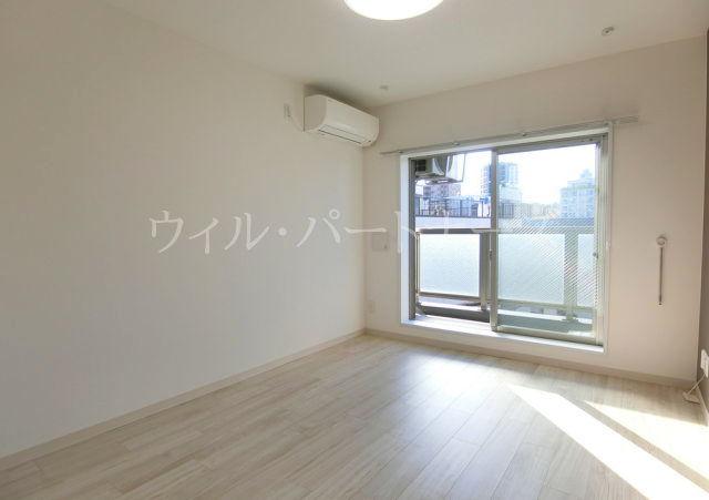 ＪＲ中央線 中野駅 徒歩10分 4階建 築10年の居間写真