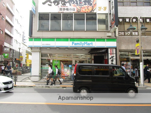 コンビニ　ファミリーマート（コンビニ）まで1100m