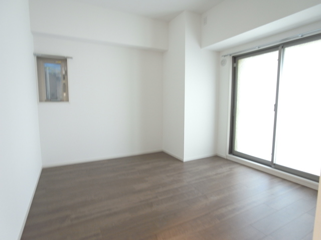 RESIDENCE KIKUZAKAの居間写真
