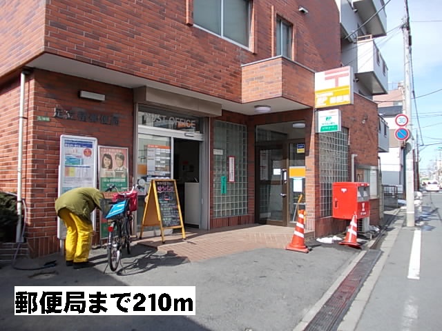 郵便局　足立椿郵便局（郵便局）まで210m