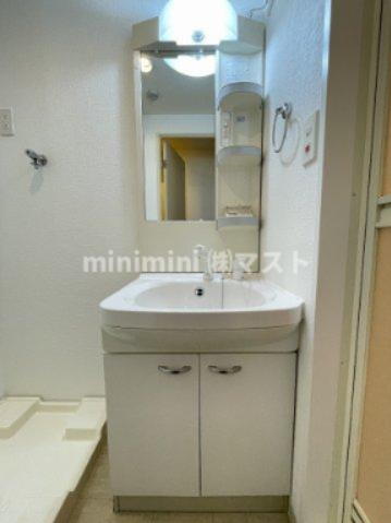 洗面設備　※同マンション別間取り参考写真です