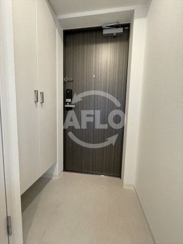 玄関　エスリード京橋アミュゼ　玄関