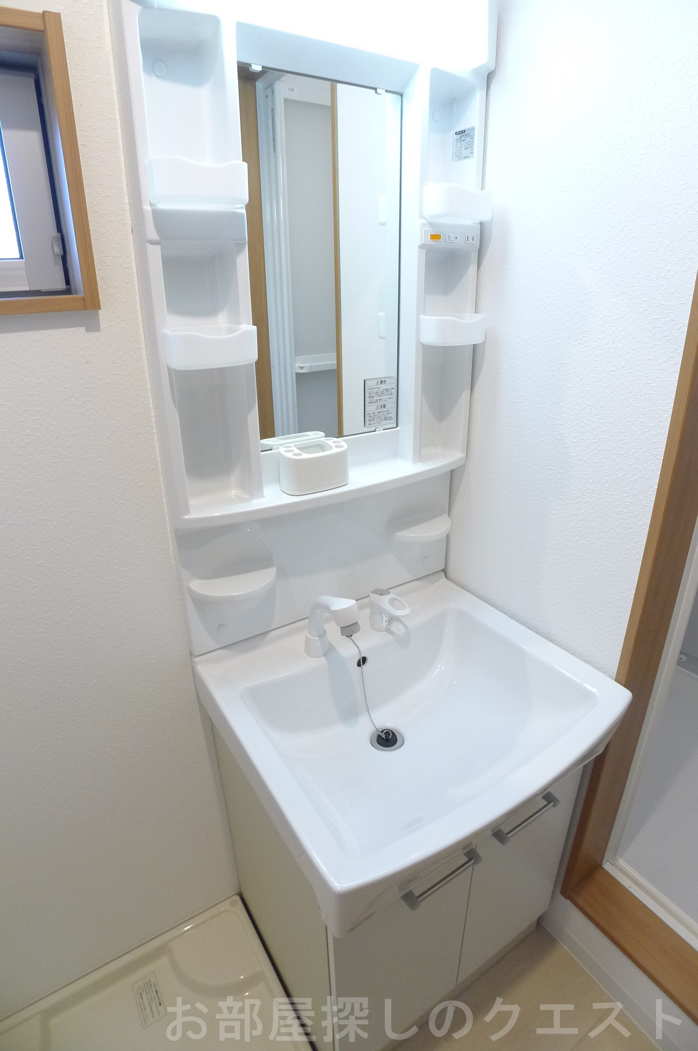 洗面設備　（写真は同仕様反転）