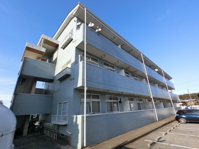成田市三里塚光ケ丘のマンションの建物外観