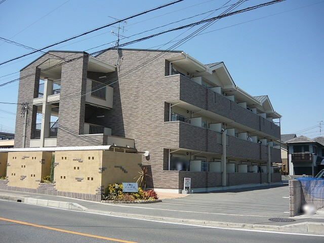 京田辺市東西神屋のマンションの建物外観