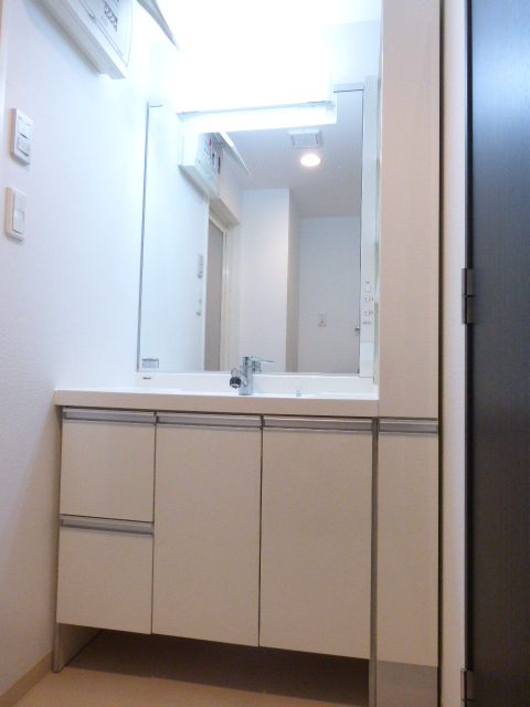 洗面設備　※別部屋の参考写真です。