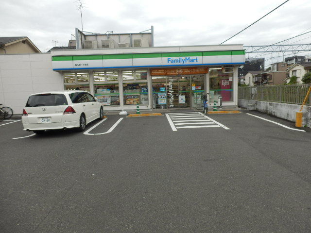 コンビニ　ファミリーマート西六郷一丁目店（コンビニ）まで518m