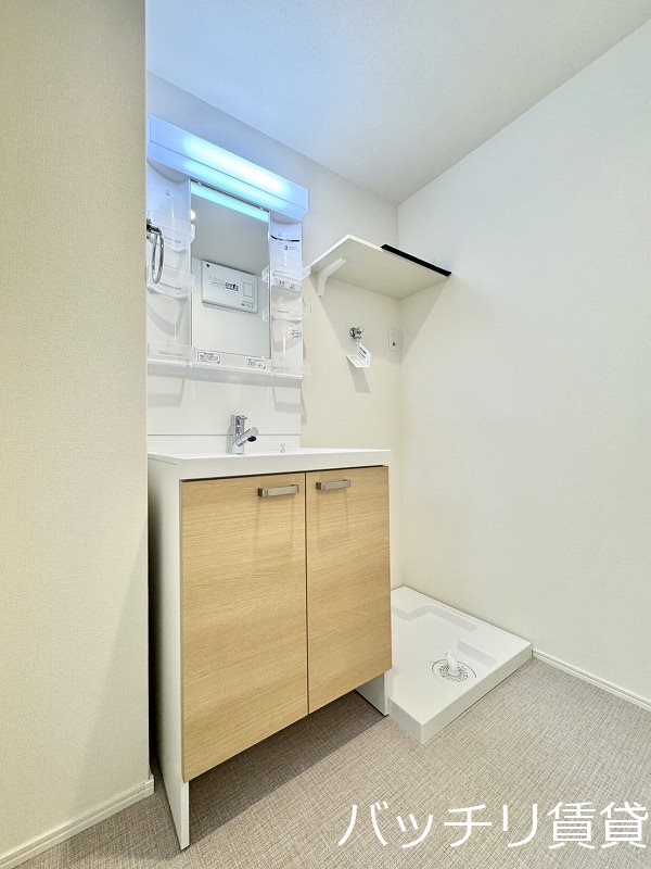 洗面設備　建築中の為　同型タイプ現状優先