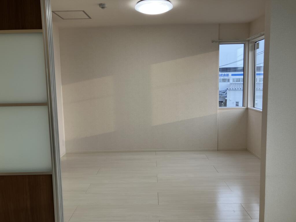 ロイジェントパークスレイクタウンIIGの居間写真