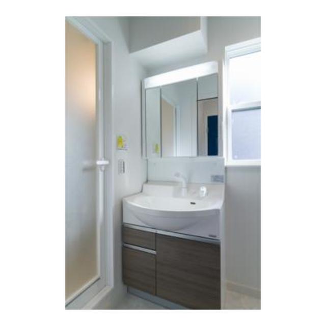 洗面設備　※写真は同タイプ住戸です。