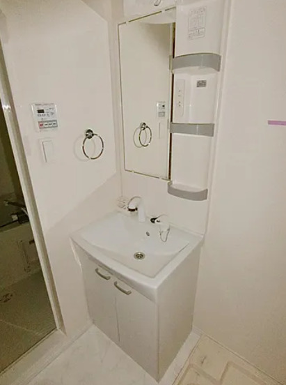 洗面設備　※別部屋の参考写真です。