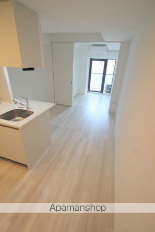 レジュールアッシュ谷町四丁目グランクラスの居間写真