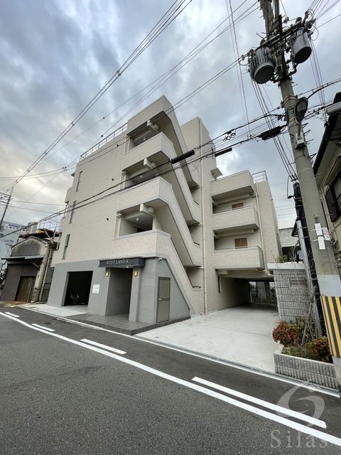 【大阪市平野区加美北のマンションの建物外観】