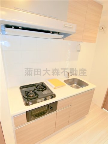 キッチン　2口ガスグリル付システムキッチン　まな板が置ける調理スペース