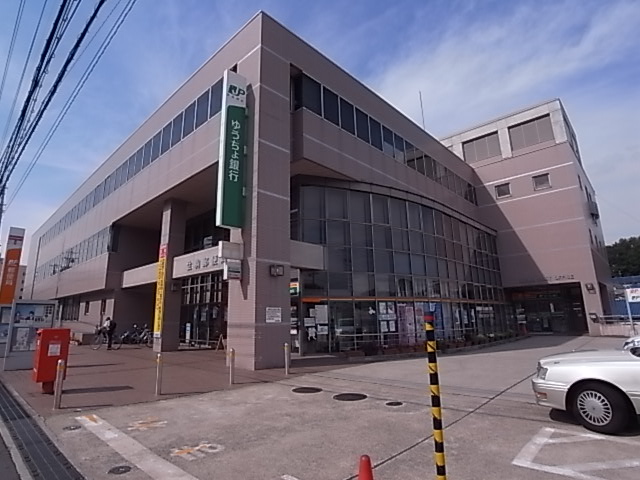 郵便局　生駒郵便局（郵便局）まで819m