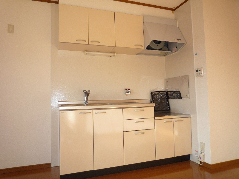 キッチン　写真はＢ201号室のものです。