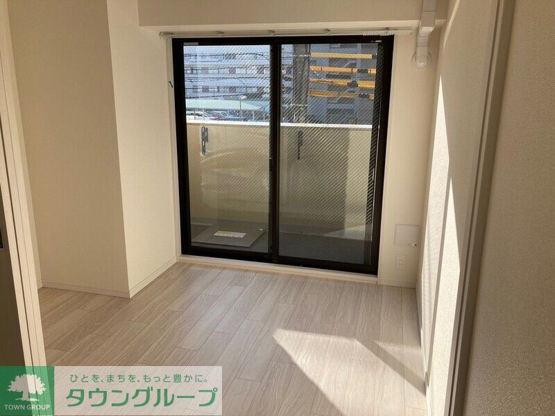 クレストコート江坂垂水町の居間写真