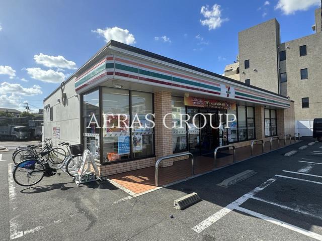 コンビニ　セブン-イレブン 足立鹿浜店（コンビニ）まで391m