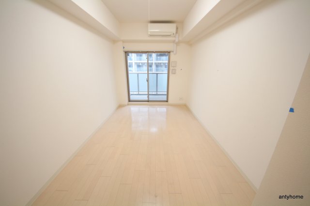 エステムプラザ梅田中崎町3ツインマークスNRの居間写真