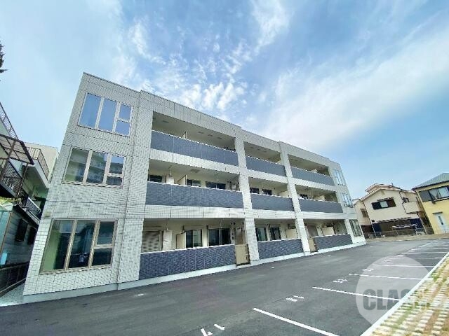 【大阪狭山市東茱萸木のマンションの建物外観】