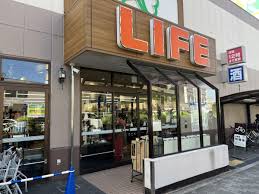 スーパー　ライフ十三東店（スーパー）まで496m