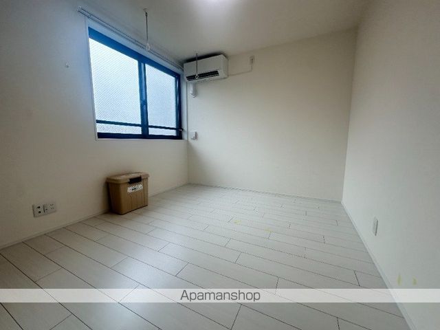 アステール旭町の居間写真