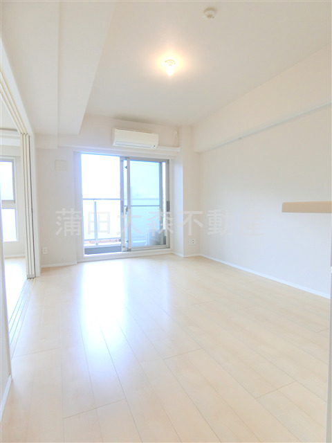 居室・リビング　西向きのLDK12.2帖　カウンターキッチンのリビングダイニ