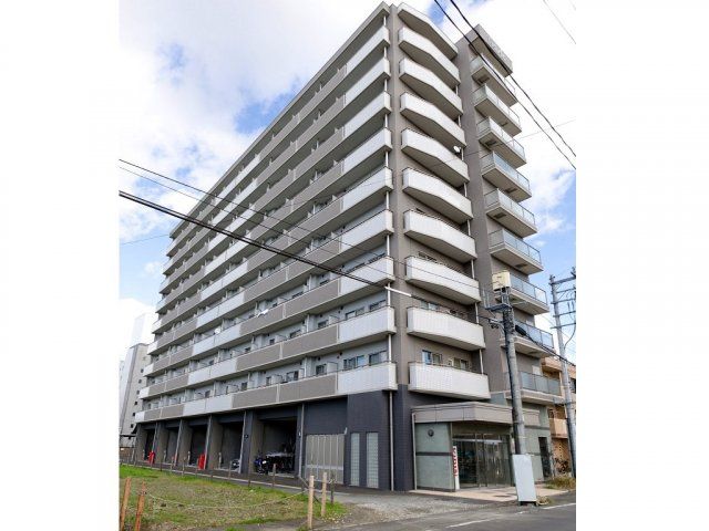 【仙台市宮城野区小田原弓ノ町のマンションの建物外観】