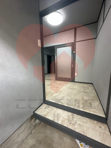 寝屋川市黒原旭町貸家の玄関写真