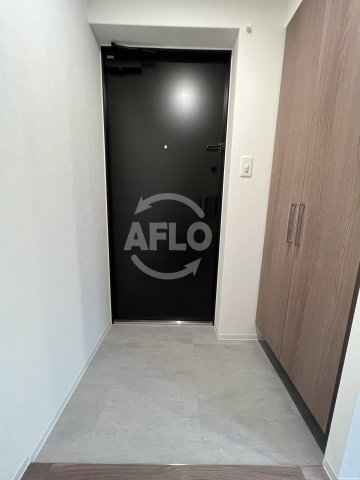 シーズンフラッツ新町の玄関写真