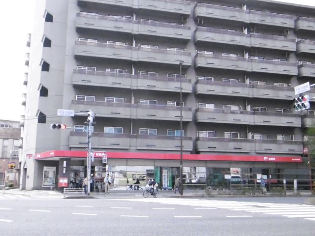 郵便局　足立中居郵便局（郵便局）まで670m