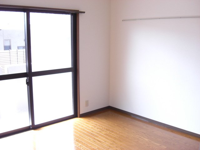 居室・リビング　写真は別号室のものです。