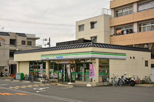 コンビニ　ファミリーマート 南吹田五丁目店（コンビニ）まで334m