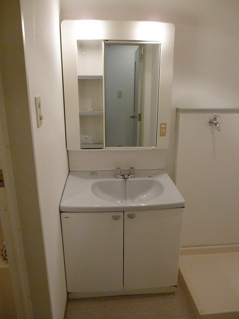 洗面設備　※写真は203号室のお部屋です。
