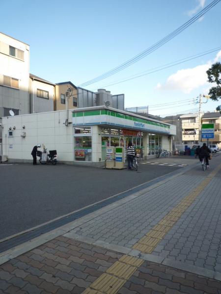 コンビニ　ファミリーマート大正北村店（コンビニ）まで386m