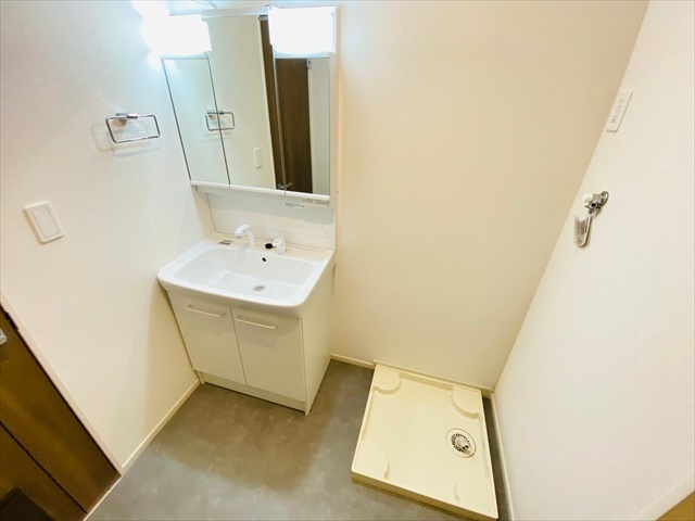 洗面設備　同一建物内２０２号室内装写真転載